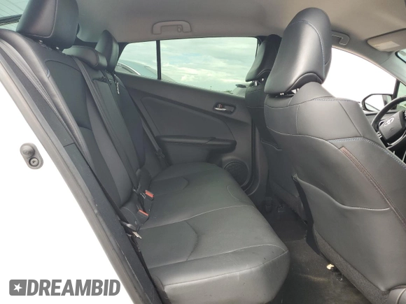 2021 Toyota Prius L Eco с VIN JTDKAMFU5M3142128, выставлен на аукционе Copart как лот 73832324 с пробегом 21 460 миль миль и Списание • Salvage title. История ставок и продаж доступна на DreamBid. Изображение 10.