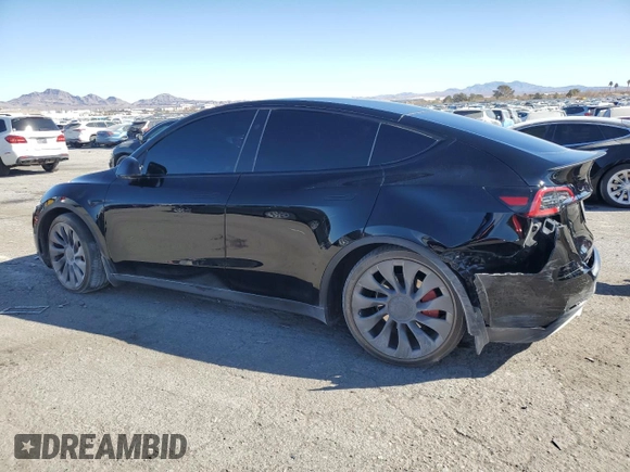 2023 Tesla Model Y Performance with VIN 7SAYGDEF8PF925238, listed as a Copart auction lot 46276925 with 28,201 mi miles and Salvage Title. Bid and sale history available at DreamBid. Image 2.