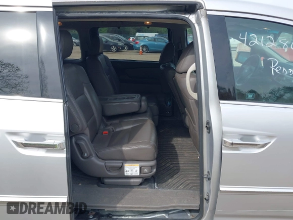 2012 Honda Odyssey Touring with VIN 5FNRL5H92CB055473, listed as a IAAI auction lot 42128601 with 163,901 mi miles. Bid and sale history available at carsss.com. Image 8.