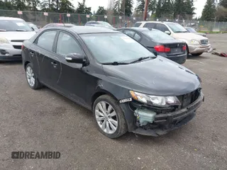 2010 Kia Forte SX with VIN KNAFW4A38A5123068, listed as a IAAI auction lot 41934416 with 95,097 mi miles. Bid and sale history available at carsss.com. Image 1.