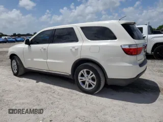 2012 Dodge Durango SXT z VIN 1C4RDHAG0CC329788, wystawiony jako Copart lot #61101745 z przebiegiem 208 302 mil mil oraz Szkoda całkowita • Salvage title. Historia ofert i sprzedaży dostępna na DreamBid. Obrazek 2.