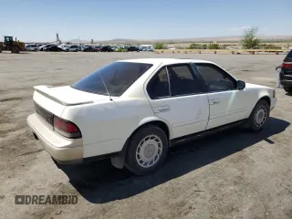 1990 Nissan Maxima z VIN JN1HJ01PXLT390008, wystawiony jako Copart lot #53529815 z przebiegiem 163 186 mil mil oraz Tytuł czysty. Historia ofert i sprzedaży dostępna na DreamBid. Obrazek 3.