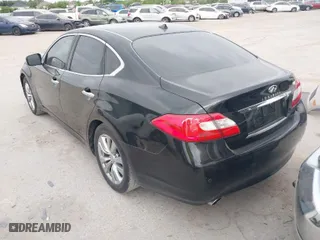 2013 Infiniti M37 with VIN JN1BY1AP0DM514046, listed as a IAAI auction lot 42031499 with 219,726 mi miles. Bid and sale history available at carsss.com. Image 3.