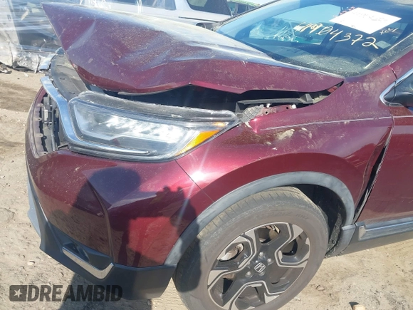 2018 Honda CR-V Touring with VIN 7FARW2H9XJE064414, listed as a IAAI auction lot 41904372 with 88,219 mi miles and . Bid and sale history available at DreamBid. Image 17.