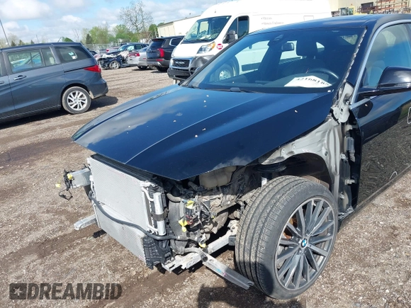 2021 BMW 2 Series 228i xDrive with VIN WBA73AK08M7J51154, listed as a IAAI auction lot 42168185 with 52,167 mi miles and . Bid and sale history available at DreamBid. Image 6.