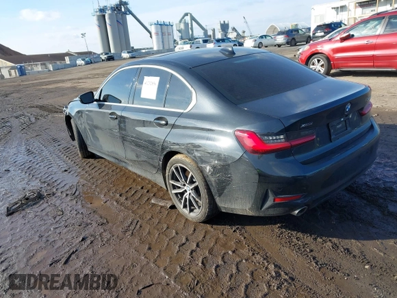 2019 BMW 3 Series 330i xDrive with VIN WBA5R7C58KFH25535, listed as a IAAI auction lot 41232856 with 85,401 mi miles. Bid and sale history available at carsss.com. Image 3.