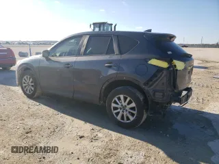2016 Mazda CX-5 Sport with VIN JM3KE2BE9G0650543, listed as a Copart auction lot 41987795 with 163,528 mi miles and Salvage Title. Bid and sale history available at carsss.com. Image 2.