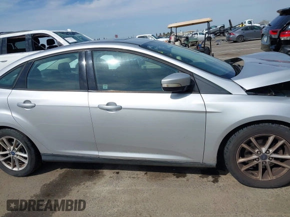 2015 Ford Focus SE with VIN 1FADP3F24FL203509, listed as a IAAI auction lot 41765582 with 139,856 mi miles. Bid and sale history available at carsss.com. Image 13.