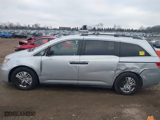 2014 Honda Odyssey LX with VIN 5FNRL5H22EB026657, listed as a IAAI auction lot 41114634 with 132,125 mi miles. Bid and sale history available at carsss.com. Image 14.