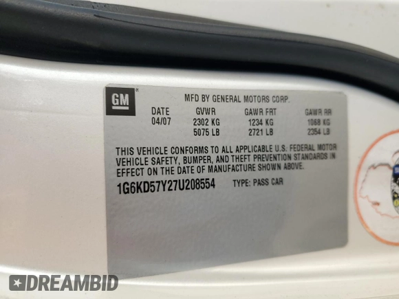 2007 Cadillac DTS V8 z VIN 1G6KD57Y27U208554, wystawiony jako Copart lot #88748645 z przebiegiem 80 341 mil mil oraz Tytuł czysty. Historia ofert i sprzedaży dostępna na DreamBid. Obrazek 12.