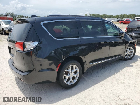 2017 Chrysler Pacifica Touring L with VIN 2C4RC1BG7HR551641, listed as a Copart auction lot 51810185 with 66,860 mi miles and Salvage Title. Bid and sale history available at DreamBid. Image 3.