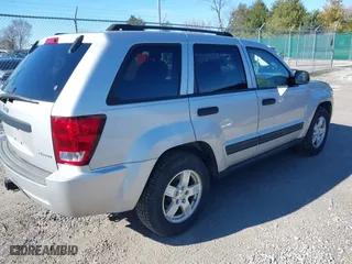 2005 Jeep Grand Cherokee Laredo with VIN 1J4HR48N65C537469, listed as a IAAI auction lot 41676555 with 226,084 mi miles. Bid and sale history available at carsss.com. Image 4.