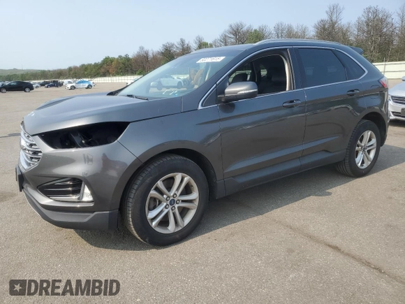 2019 Ford Edge SEL z VIN 2FMPK4J9XKBC67141, wystawiony jako Copart lot #60271615 z przebiegiem 100 400 mil mil oraz Szkoda całkowita • Salvage title. Historia ofert i sprzedaży dostępna na DreamBid. Obrazek 1.