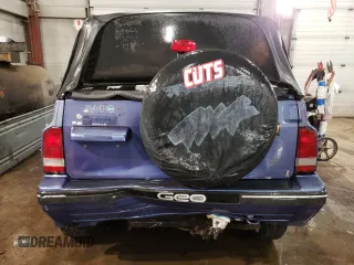 1995 Chevrolet Tracker z VIN 2CNBJ1866S6934268, wystawiony jako Copart lot #41997375 z przebiegiem 152 848 mil mil oraz Szkoda całkowita • Salvage title. Historia ofert i sprzedaży dostępna na DreamBid. Obrazek 6.