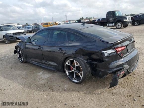 2024 Audi RS 5 Sportback with VIN WUAAWCF52RA900903, listed as a Copart auction lot 76949274 with 5,867 mi miles and Salvage Title. Bid and sale history available at carsss.com. Image 2.