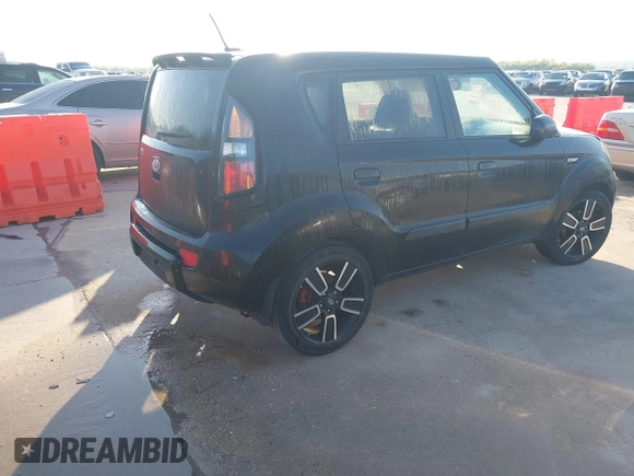 2010 Kia Soul + with VIN KNDJT2A25A7127326, listed as a IAAI auction lot 41966153 with 216,660 mi miles. Bid and sale history available at carsss.com. Image 4.