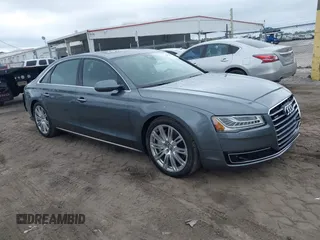 2015 Audi A8 3.0T z VIN WAU3GAFD5FN005065, wystawiony jako IAAI lot #41630450 z przebiegiem 122 939 mil mil oraz . Historia ofert i sprzedaży dostępna na DreamBid. Obrazek 13.