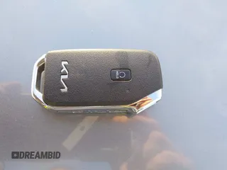 2023 Kia Forte GT-Line z VIN 3KPF54AD0PE673666, wystawiony jako IAAI lot #41242873 z przebiegiem 24 075 mil mil oraz . Historia ofert i sprzedaży dostępna na DreamBid. Obrazek 11.