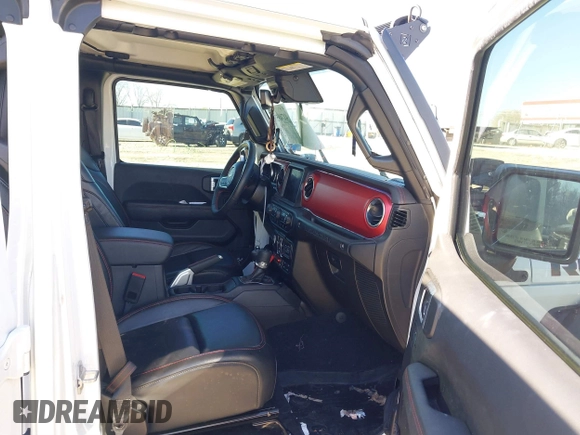 2022 Jeep Wrangler Unlimited Rubicon z VIN 1C4JJXFGXNW121489, wystawiony jako IAAI lot #41749550 z przebiegiem 56 601 mil mil oraz . Historia ofert i sprzedaży dostępna na DreamBid. Obrazek 5.