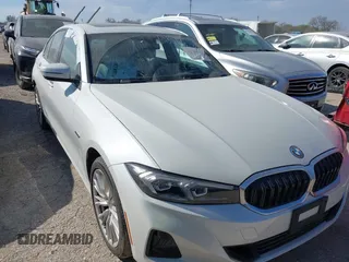 2023 BMW 3 Series 330e xDrive with VIN 3MW39FS0XP8D03304, listed as a IAAI auction lot 41358861 with 33,899 mi miles. Bid and sale history available at carsss.com. Image 1.