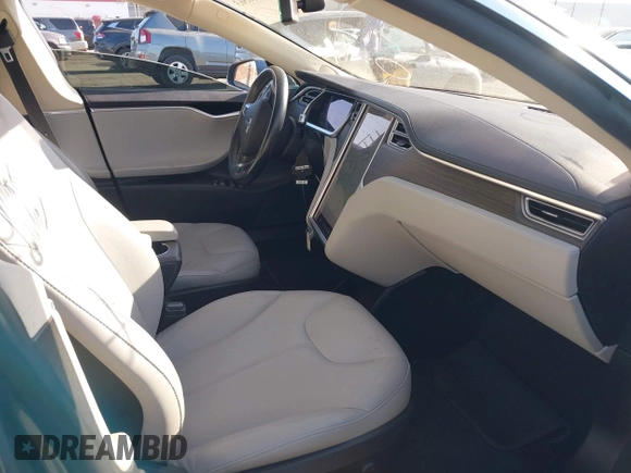 2014 Tesla Model S 60 with VIN 5YJSA1S11EFP35998, listed as a IAAI auction lot 42316563 with 83,835 mi miles and . Bid and sale history available at DreamBid. Image 5.