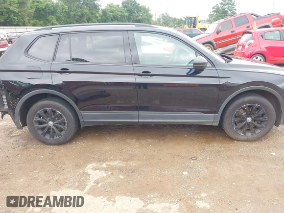 2020 Volkswagen Tiguan S with VIN 3VV1B7AX7LM102966, listed as a IAAI auction lot 42365428 with 94,921 mi miles and . Bid and sale history available at DreamBid. Image 14.