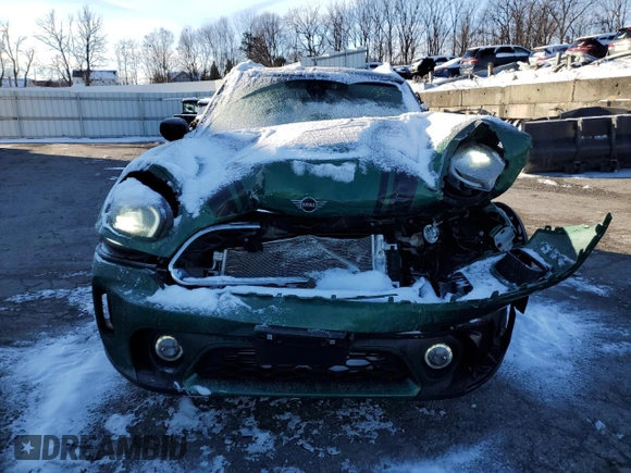 2023 MINI Countryman Cooper S z VIN WMZ53BR00P3R14737, wystawiony jako Copart lot #85615774 z przebiegiem 21 653 mil mil oraz Szkoda całkowita • Salvage title. Historia ofert i sprzedaży dostępna na DreamBid. Obrazek 5.