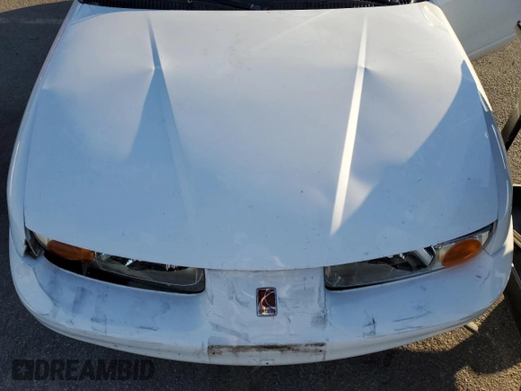 2001 Saturn SL z VIN 1G8ZK52771Z219294, wystawiony jako Copart lot #83155494 z przebiegiem 190 338 mil mil oraz Szkody całkowita. Historia ofert i sprzedaży dostępna na DreamBid. Obrazek 11.