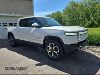 2023 Rivian R1T Adventure z VIN 7FCTGAAA1PN020478, wystawiony jako IAAI lot #42361936 z przebiegiem 443 mil mil oraz . Historia ofert i sprzedaży dostępna na DreamBid. Obrazek 1.