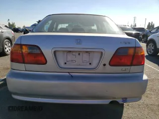 1999 Honda Civic LX with VIN 2HGEJ6571XH552867, listed as a Copart auction lot 81715654 with 234,544 mi miles and Salvage Title. Bid and sale history available at DreamBid. Image 6.