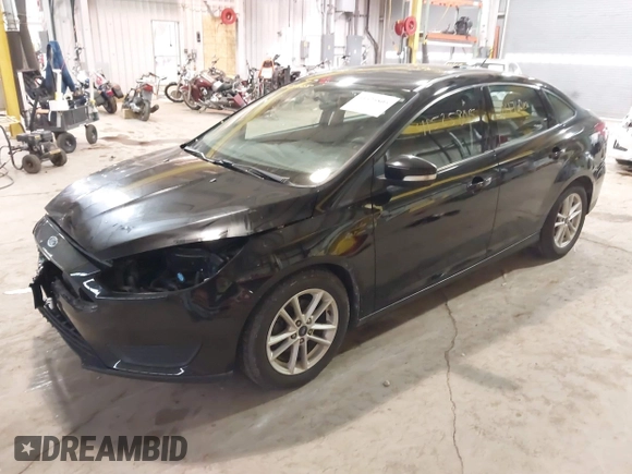 2017 Ford Focus SE with VIN 1FADP3F22HL292063, listed as a IAAI auction lot 41525805 with 104,760 mi miles and . Bid and sale history available at DreamBid. Image 2.