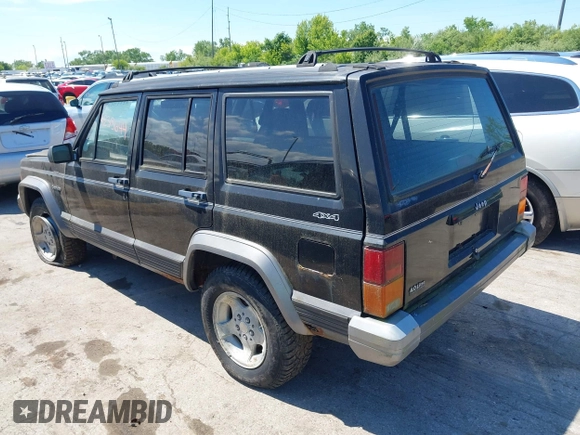 1995 Jeep Cherokee Country z VIN 1J4FJ78S9SL666002, wystawiony jako IAAI lot #42313644 z przebiegiem 226 914 mil mil oraz . Historia ofert i sprzedaży dostępna na DreamBid. Obrazek 3.