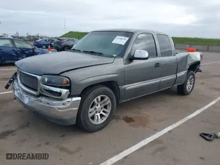 2002 GMC Sierra 1500 SLE with VIN 2GTEC19V121231109, listed as a IAAI auction lot 41906878 with 237,729 mi miles. Bid and sale history available at carsss.com. Image 2.