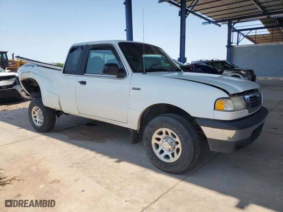 2000 Mazda B-Series 2WD Truck SE with VIN 4F4YR16C6YTM11839, listed as a Copart auction lot 64460754 with 245,958 mi miles and Salvage Title. Bid and sale history available at carsss.com. Image 4.