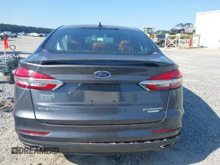 2020 Ford Fusion Titanium with VIN 3FA6P0K91LR175109, listed as a IAAI auction lot 42267532 with 75,000 mi miles and . Bid and sale history available at DreamBid. Image 16.