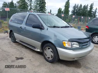 2000 Toyota Sienna LE with VIN 4T3ZF13C2YU184379, listed as a IAAI auction lot 42588358 with 232,441 mi miles and . Bid and sale history available at DreamBid. Image 1.