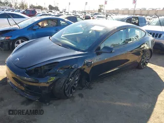 2021 Tesla Model 3 Performance with VIN 5YJ3E1EC6MF999321, listed as a IAAI auction lot 41417451 with 20,562 mi miles and . Bid and sale history available at carsss.com. Image 22.