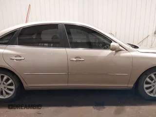 2006 Hyundai Azera SE with VIN KMHFC46F56A095383, listed as a IAAI auction lot 42373827 with 189,091 mi miles and . Bid and sale history available at DreamBid. Image 14.