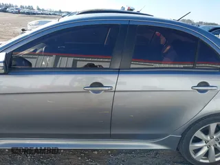 2015 Mitsubishi Lancer GT with VIN JA32U8FWXFU025656, listed as a IAAI auction lot 41482098 with 295,626 mi miles. Bid and sale history available at carsss.com. Image 14.