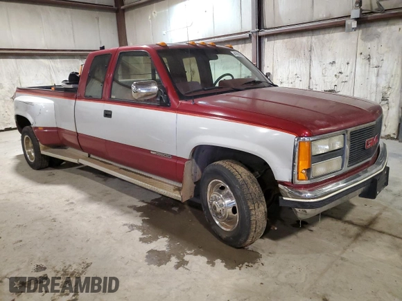 1991 GMC Sierra 1500 with VIN 2GTHC39K2M1538208, listed as a Copart auction lot 41664305 with 56,293 mi miles and Salvage Title. Bid and sale history available at DreamBid. Image 4.