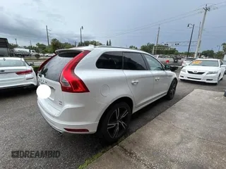 2017 Volvo XC60 R-Design with VIN YV449MRS8H2035952, listed as a Copart auction lot 56962295 with 81,347 mi miles and Clean title. Bid and sale history available at DreamBid. Image 4.