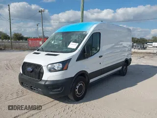 2021 Ford Transit Cargo with VIN 1FTBR1C85MKA19997, listed as a IAAI auction lot 41431285 with 61,158 mi miles and . Bid and sale history available at DreamBid. Image 2.