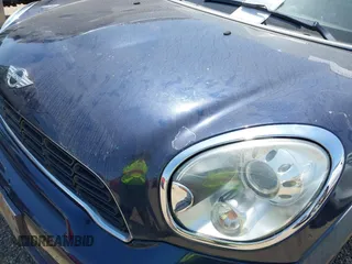 2012 MINI Countryman S with VIN WMWZC3C55CWL82709, listed as a IAAI auction lot 42002966 with 120,611 mi miles and . Bid and sale history available at DreamBid. Image 6.