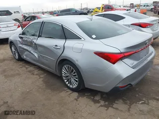 2019 Toyota Avalon Hybrid Limited with VIN 4T1B21FB2KU005306, listed as a IAAI auction lot 41586866 with 90,543 mi miles. Bid and sale history available at carsss.com. Image 3.