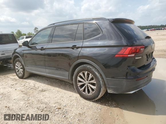2018 Volkswagen Tiguan S with VIN 3VV1B7AX9JM020833, listed as a Copart auction lot 54539565 with 69,904 mi miles and Salvage title. Bid and sale history available at DreamBid. Image 2.