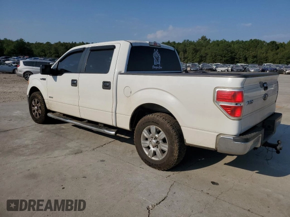 2012 Ford F-150 XL with VIN 1FTFW1CT4CKD85026, listed as a Copart auction lot 74925764 with 221,643 mi miles and Salvage Title. Bid and sale history available at carsss.com. Image 2.