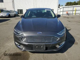 2018 Ford Fusion Titanium with VIN 3FA6P0D95JR188357, listed as a Copart auction lot 55994895 with 123,214 mi miles and Salvage title. Bid and sale history available at DreamBid. Image 5.