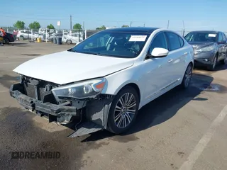 2014 Kia Cadenza Premium z VIN KNALN4D79E5146921, wystawiony jako IAAI lot #42164954 z przebiegiem 170 272 mil mil oraz . Historia ofert i sprzedaży dostępna na DreamBid. Obrazek 2.