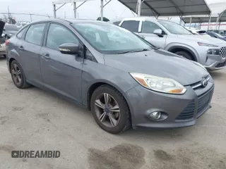 2014 Ford Focus SE with VIN 1FADP3F24EL416510, listed as a IAAI auction lot 41911464 with 186,153 mi miles. Bid and sale history available at carsss.com. Image 1.
