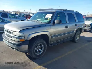 2002 Chevrolet Tahoe Z71 with VIN 1GNEK13Z32R125421, listed as a IAAI auction lot 41859011 with 216,021 mi miles. Bid and sale history available at carsss.com. Image 2.